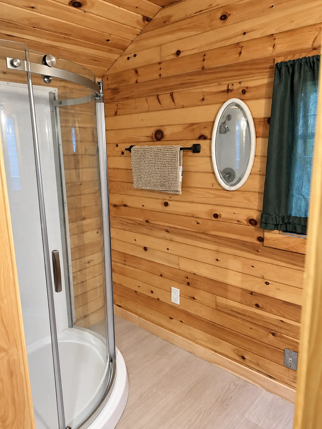 Corner shower with glass surround