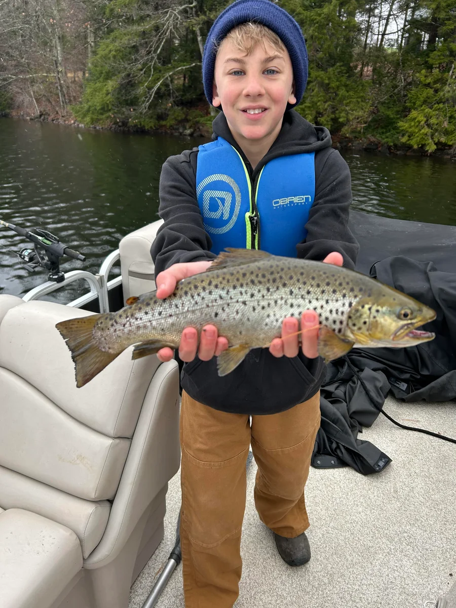 A big brown trout caught on a China Lake charter